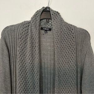 Long sweater with a bit of flair!